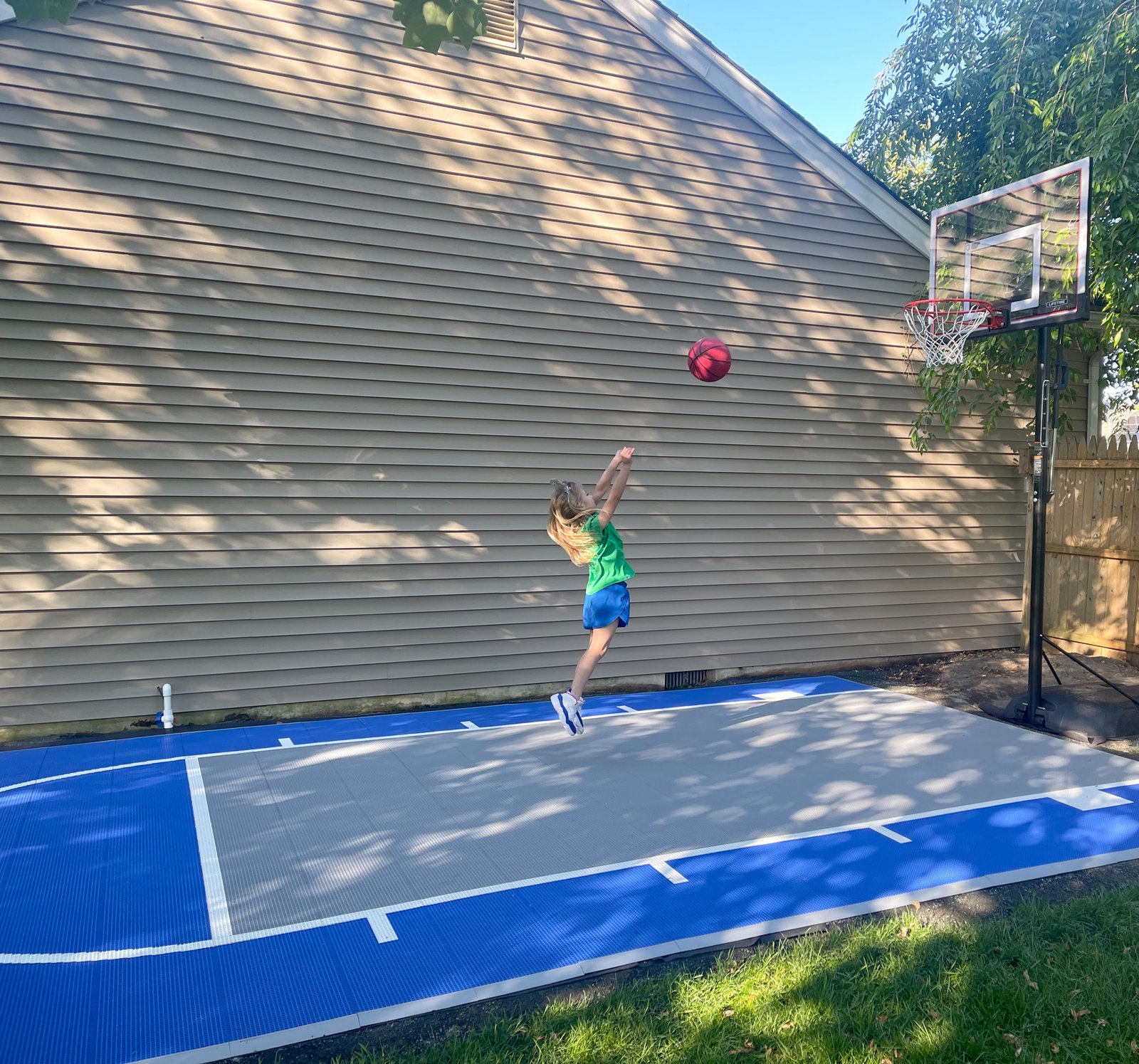 Freshly installed interlocking tile court