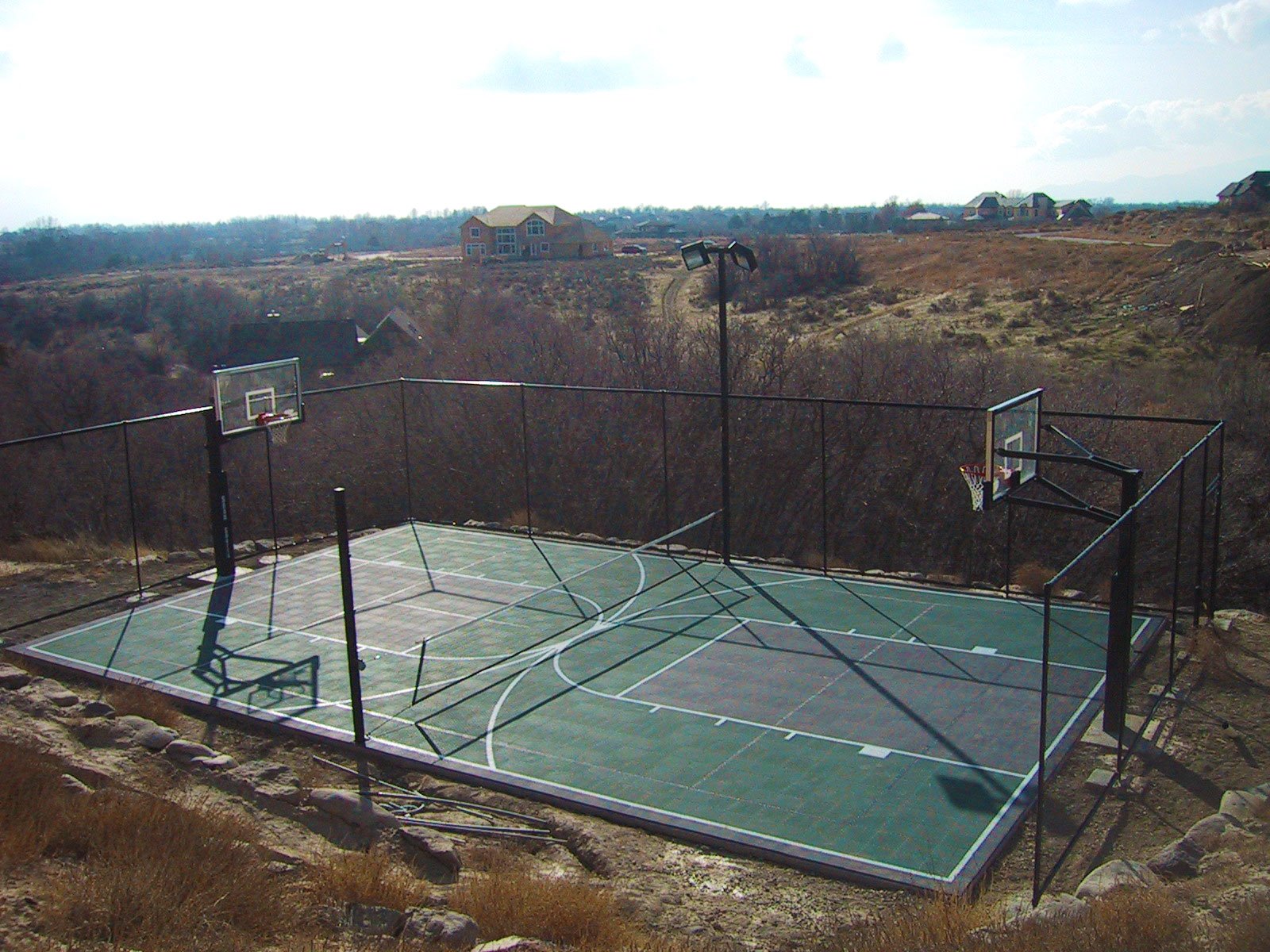 The Estate — Full multi-sport court · blue & grey