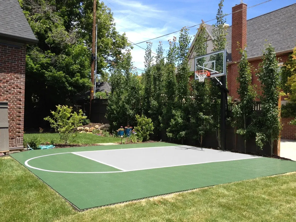 Backyard basketball half court with free-throw line